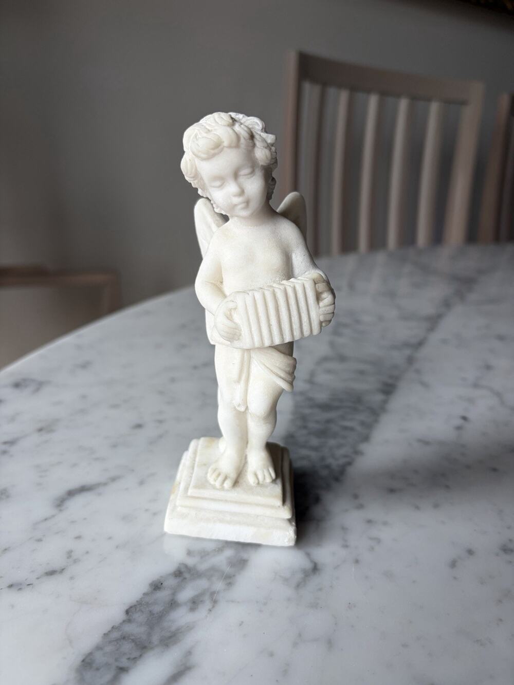 White Angel Statue Playing Accordion Christian Religious Figurine Angels Stone?